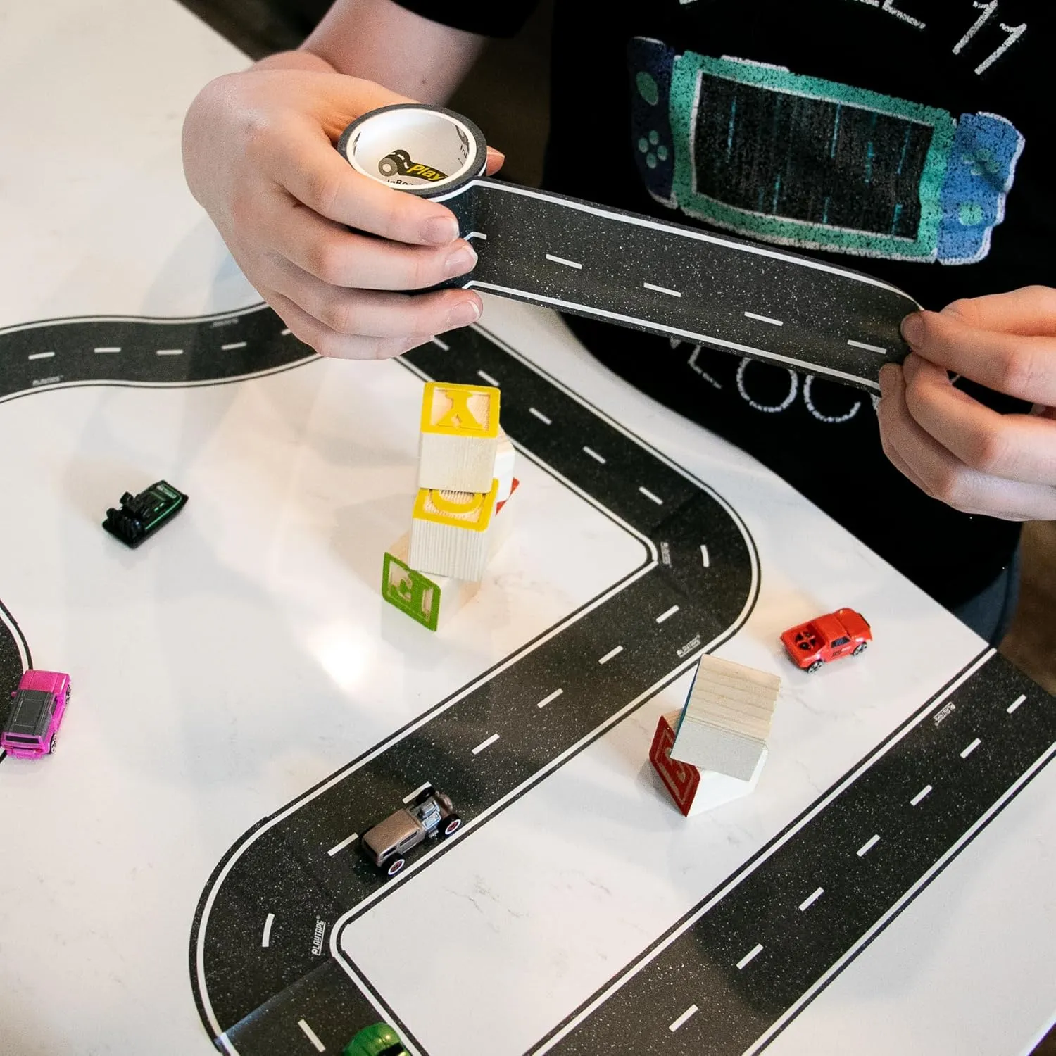 PlayTape Road Tape for Toy Cars - Sticks to Flat Surfaces, No Residue; 8-Pack of 30 ft. x 2 in. Asphalt Road