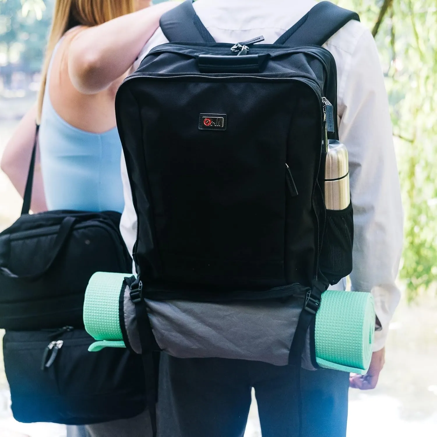 Trilogy Weekender Daypack I Opens like a suitcase, for easy packing. Expands into a 22-liter weekender bag. Hidden under sling holds yoga mat or sleeping bag, and doubles as a rear cover (Black)