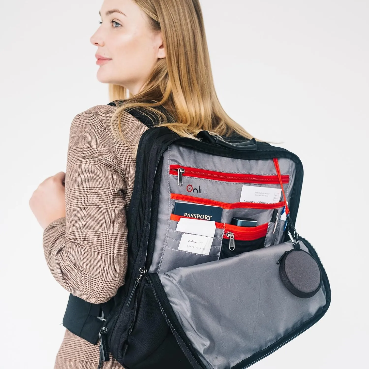 Trilogy Weekender Daypack I Opens like a suitcase, for easy packing. Expands into a 22-liter weekender bag. Hidden under sling holds yoga mat or sleeping bag, and doubles as a rear cover (Black)